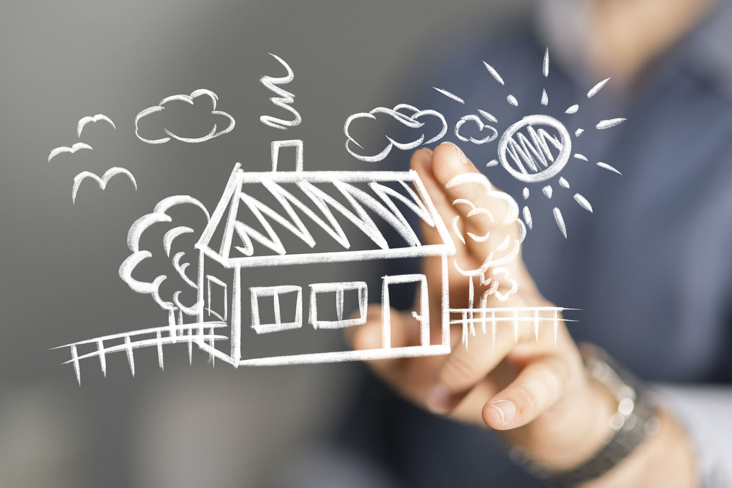 Traumhau gezeichnetes Traumhaus auf Fensterscheibe